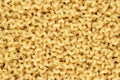 Dry uncooked cellentani pasta texture background Royalty Free Stock Photo