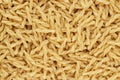 Dry uncooked gemelli pasta texture background Royalty Free Stock Photo