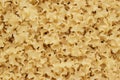 Dry uncooked pasta texture background Royalty Free Stock Photo