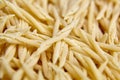 Dry Uncooked Trofie Italian Pasta . Food Background