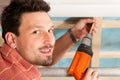 Dry waller with cordless screwdriver Royalty Free Stock Photo