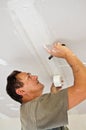 Dry waller working at the ceiling Royalty Free Stock Photo