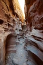 Dry wash in a narrow, undulating slot canyon Royalty Free Stock Photo