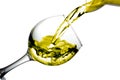 Dry white wine is poured into a glass