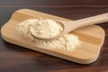 Dry yeast in a spoon for making dough. Generative ai