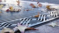 Dry yellow autumn fallen maple leaves, metal grate on ground of american street. Royalty Free Stock Photo