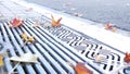 Dry yellow autumn fallen maple leaves, metal grate on ground of american street. Royalty Free Stock Photo