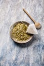 Dry yerba mate leaves on wooden background. Royalty Free Stock Photo