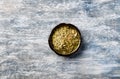 Dry yerba mate leaves on wooden background. Top view. Royalty Free Stock Photo