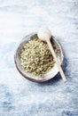 Dry yerba mate leaves on wooden background. Top view. Royalty Free Stock Photo