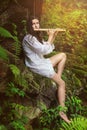 Dryad playing flute after the rain