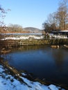 Dryden Lake, hills and dam in a winter vista Royalty Free Stock Photo