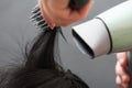 Drying black hair after dying Royalty Free Stock Photo