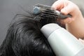 Drying black hair after dying Royalty Free Stock Photo