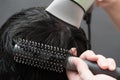 Drying black hair after dying Royalty Free Stock Photo