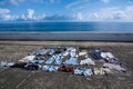 Drying clothes on the pavement at seafront Royalty Free Stock Photo
