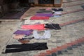 Drying clothes on a tiled surface in a city in India