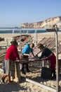 Drying fish on the beach in Nazare, Portugal