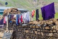 Drying laundry and manure in Xinaliq Khinalug village, Azerbaij