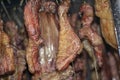 Drying meat in the smokehouse to smoke Royalty Free Stock Photo