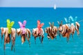 Drying the octopus in the sun in the seaside village of Plaka on Royalty Free Stock Photo