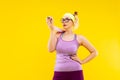 Blonde-haired woman drying her sweat after time at gym Royalty Free Stock Photo
