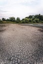 Dry lake in Bavaria Germany. Drought and climate change, landscape of cracked earth after lake has dried up in summer. Water Royalty Free Stock Photo