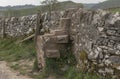 Drystone wall with stone sty Royalty Free Stock Photo