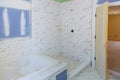 New under construction bathroom interior with drywall and patching Royalty Free Stock Photo