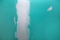 Drywall hydrophobic plasterboard in green plaste seam Royalty Free Stock Photo