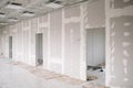 Drywall wall home interior decoration at construction site with copy space Royalty Free Stock Photo