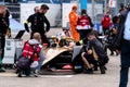 DS Automobiles staff members checking a race car