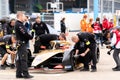 DS Automobiles staff members checking a race car