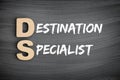 DS - Destination Specialist acronym, business concept text on blackboard