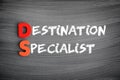 DS - Destination Specialist acronym, business concept text on blackboard