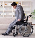 Dsabled businessman on wheelchair working home Royalty Free Stock Photo
