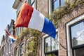 Dutch flags on the facade of a house Royalty Free Stock Photo