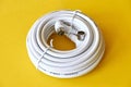 Roll of white coaxial antenna cable Royalty Free Stock Photo