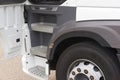 Cabin stairs of a white truck with DAF logo