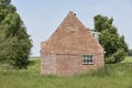 Old decaying shed with red bricks Royalty Free Stock Photo