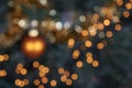 Blurred orange lights in Christmas tree