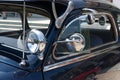 Chevrolet two-door Aero Sedan Fleetline from 1948. Details, car light, mirrors