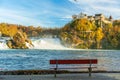 Red bench view of Rhine Falls landscape. Neuhausen am Rheinfall, Schaffhausen, Switzerland Royalty Free Stock Photo