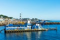 DSC dredge Twin Lakes is dredging sand and silt in harbor channel of Santa Cruz Small Craft Harbor