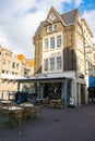 Scenic eatery or restaurant in an ancient building in the old city center of Dordrecht, Netherlands. Royalty Free Stock Photo
