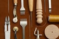 Leather Crafting Tools on the Genuine Leather on the Table, Handicraftsman Equipment for DIY Leather Works