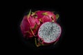 Fresh and Raw Dragon Fruit on iSolated Black background, Many Nutritions with Healthy Fruit for Diet. Royalty Free Stock Photo