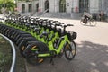 A row of green Go Sharing electrical bikes in a city Royalty Free Stock Photo