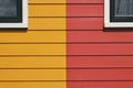 Detail photo of red and yellow painted houses Royalty Free Stock Photo