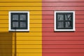 Detail photo of red and yellow painted houses Royalty Free Stock Photo